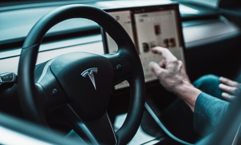 Tesla logo on vehicle steering wheel