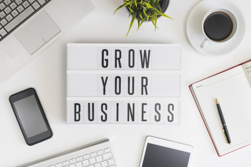 Grow your business words on office table